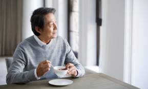 Elderly Asian Man Eating Getty Images