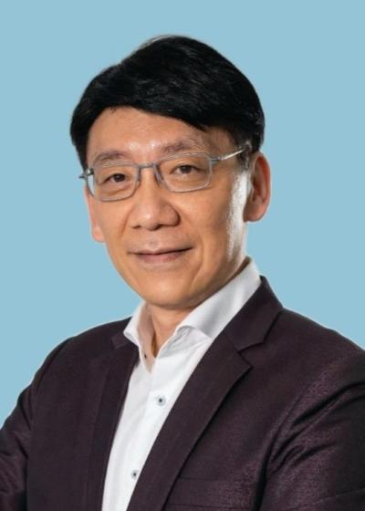 Dr  Nguyen Gia Hung Desmond 20260910 Blue Background Cut