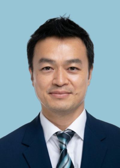 Dr Hui Chuk Man 20250902 Blue Headshot 1
